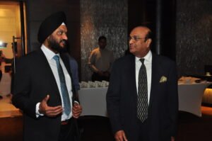 R.S. Kalsi Head of Sales & Marketing Maruti with Dr. Raghupati Singhania Chairman & MD JK Tyre