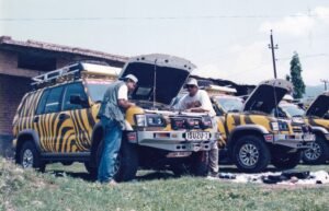 Getting prepared. Bob and Suvir with their Isuzu Trooper prior to the start of the expedition