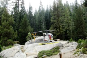 The camp was difficult to reach so supplies came in a chopper