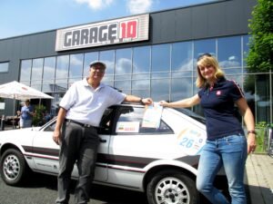 Bob met his navigator Carolin just an hour before the start and here they are holding the road book